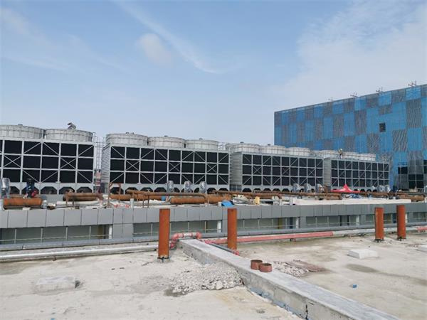為何冷卻塔的安裝位置要考慮水系統(tǒng)的承壓要求？,冷卻塔安裝圖